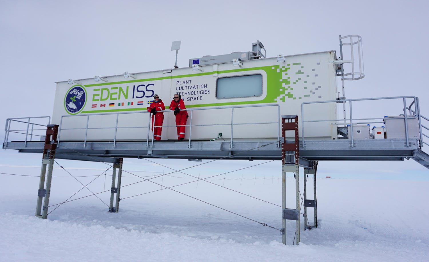 Anna-Lisa Paul (left) and Robert Ferl, (right) the principal investigators of the UF space plants lab, stand outside of the EDEN ISS greenhouse in Antarctica where plants are cultivated in extreme conditions with the goal of learning how to successfully grow plants in space.