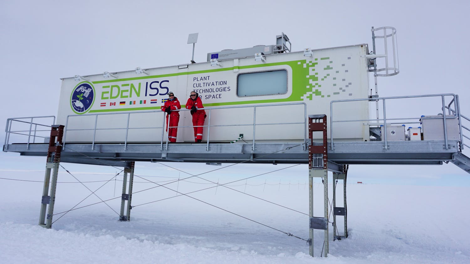 Anna-Lisa Paul (left) and Robert Ferl, (right) the principal investigators of the UF space plants lab, stand outside of the EDEN ISS greenhouse in Antarctica where plants are cultivated in extreme conditions with the goal of learning how to successfully grow plants in space.