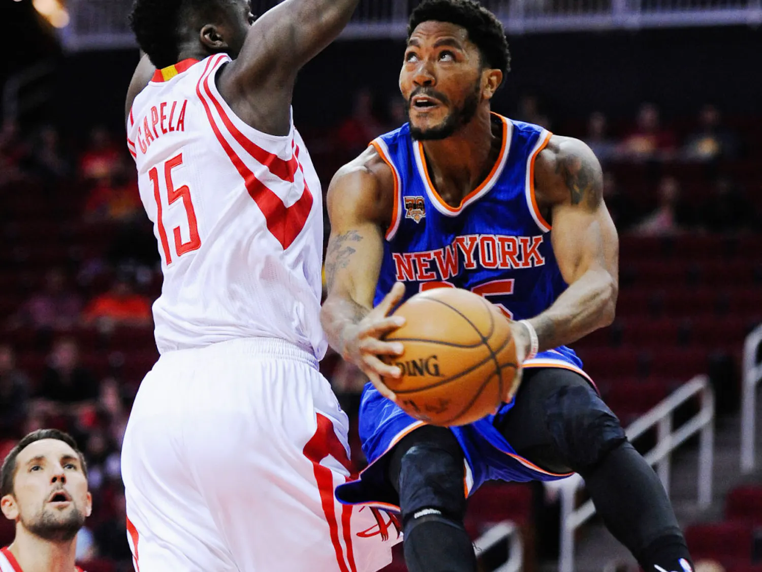 In this Tuesday, Oct. 4, 2016, photo, New York Knicks guard Derrick Rose plays in an NBA preseason game in Houston. NBA star Rose is set to return to the witness stand in a $21 million lawsuit that alleges he and two friends raped an incapacitated woman. Before Rose retakes the stand Tuesday, Oct. 11, a judge will consider a mistrial request from Rose's lawyer. (AP Photo/George Bridges)