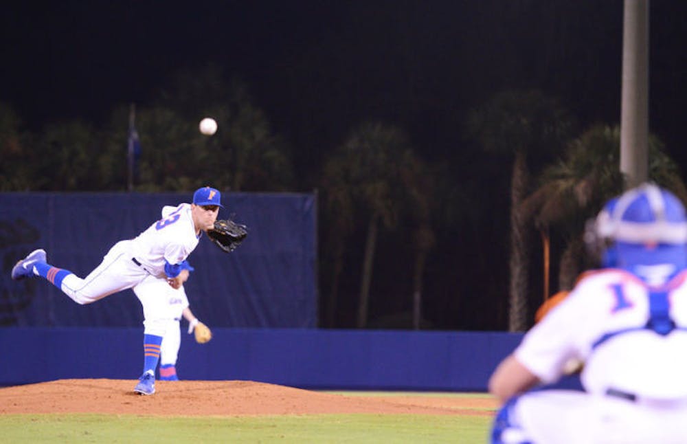 <p>Right-handed starting pitcher Jonathon Crawford (23) throws a pitch during Florida’s 4-3 loss to Duke on Friday at McKethan Stadium. Crawford threw a career-high 103 pitches during six innings of work in Florida's 3-2 loss to Miami on Friday.</p>