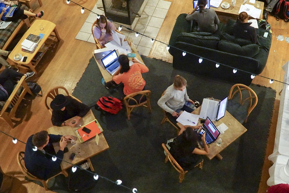 Students crowd Pascal’s Coffeehouse on Dec. 8, 2015. Juan Alcala, the study center’s manager, said students always bring more business during finals week.