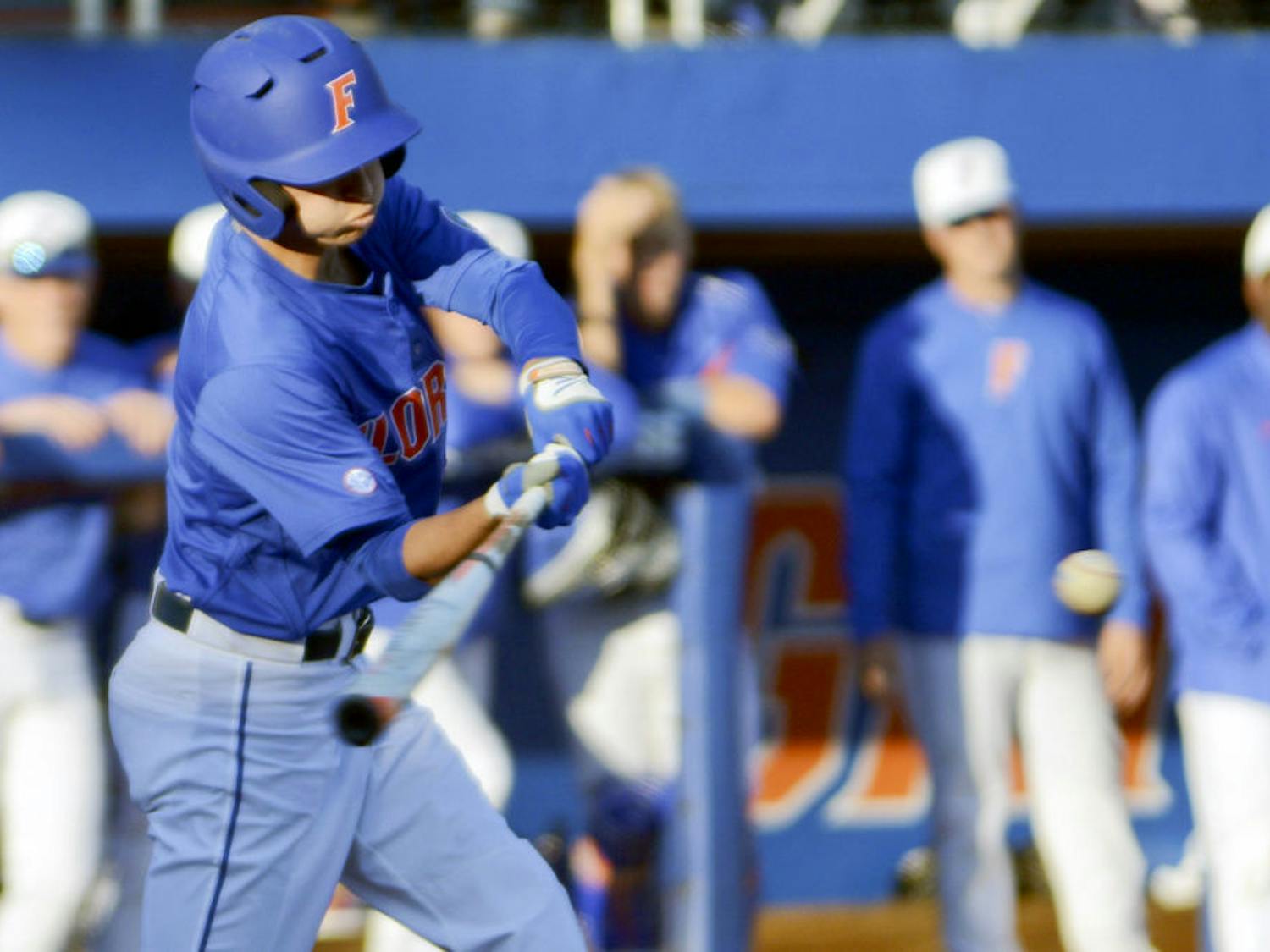 Dalton Guthrie bats during Florida's 22-3 win against Rhode Island on Saturday at McKethan Stadium.