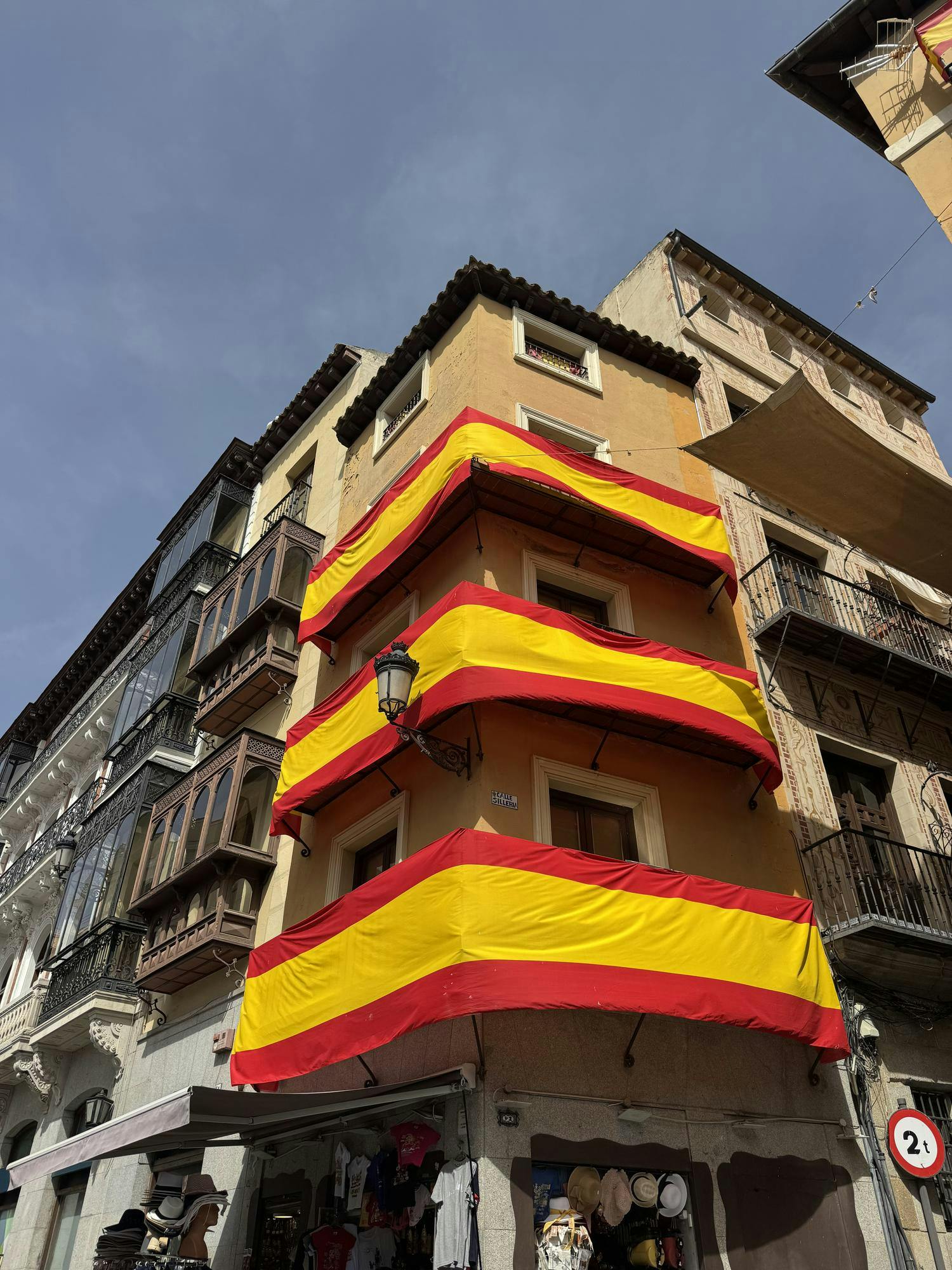 Spanish flags fly on a building in Plaza de Zocodover, Saturday, June 20, 2026, in Toledo, Spain.