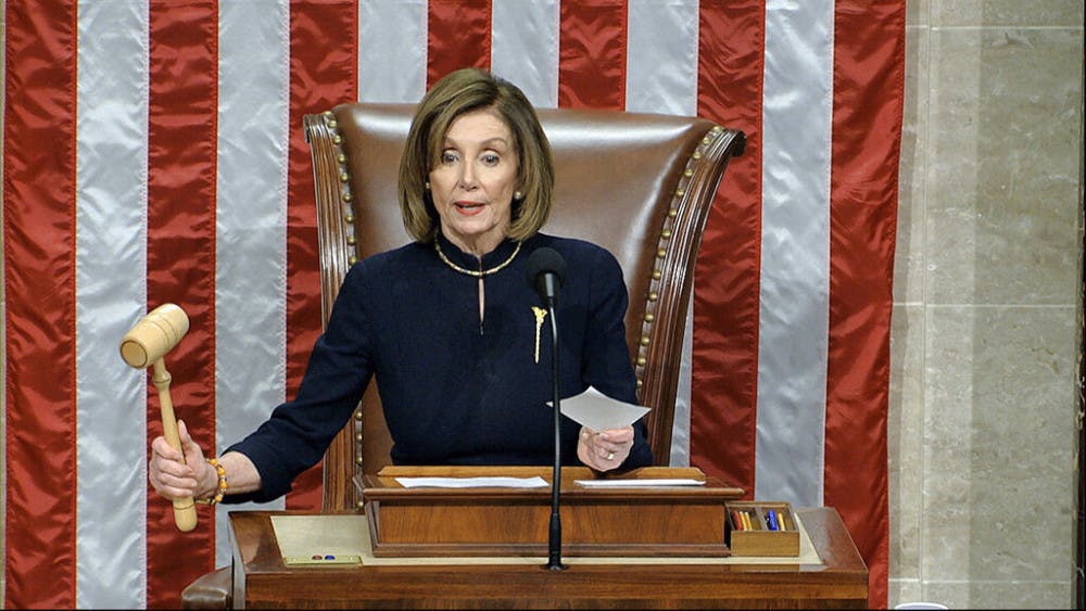 House Speaker Nancy Pelosi of Calif., announces the passage of the first article of impeachment, abuse of power, against President Donald Trump by the House of Representatives at the Capitol in Washington, Wednesday, Dec. 18, 2019. (House Television via AP)