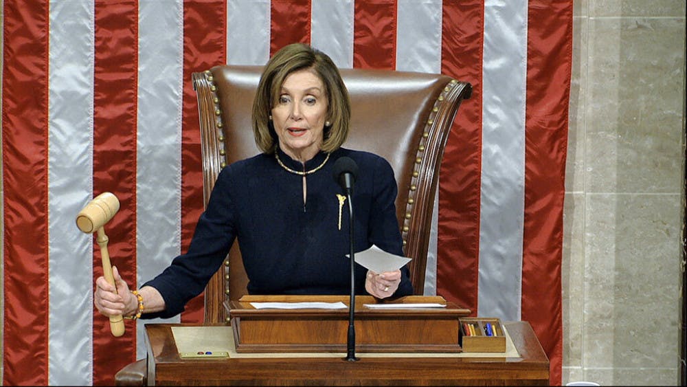 <p>House Speaker Nancy Pelosi of Calif., announces the passage of the first article of impeachment, abuse of power, against President Donald Trump by the House of Representatives at the Capitol in Washington, Wednesday, Dec. 18, 2019. (House Television via AP)</p>