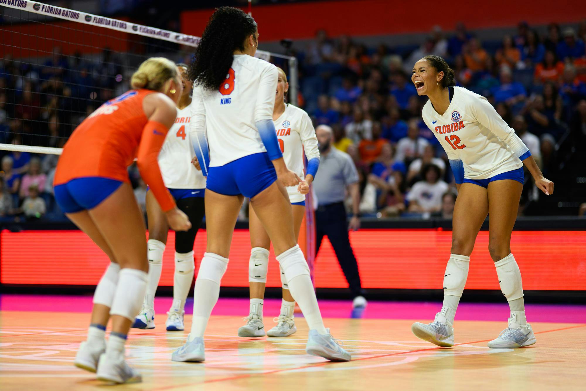 Florida outside hitter Kira Hutson (12) celebrates winning a point during an NCAA Volleyball match against FAU, Friday, Sept. 11, 2026, in Gainesville, Fla.