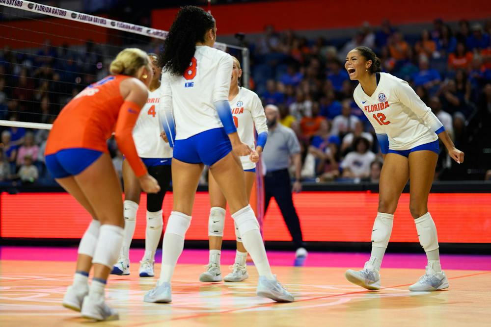 Florida outside hitter Kira Hutson (12) celebrates winning a point during an NCAA Volleyball match against FAU, Friday, Sept. 11, 2026, in Gainesville, Fla.