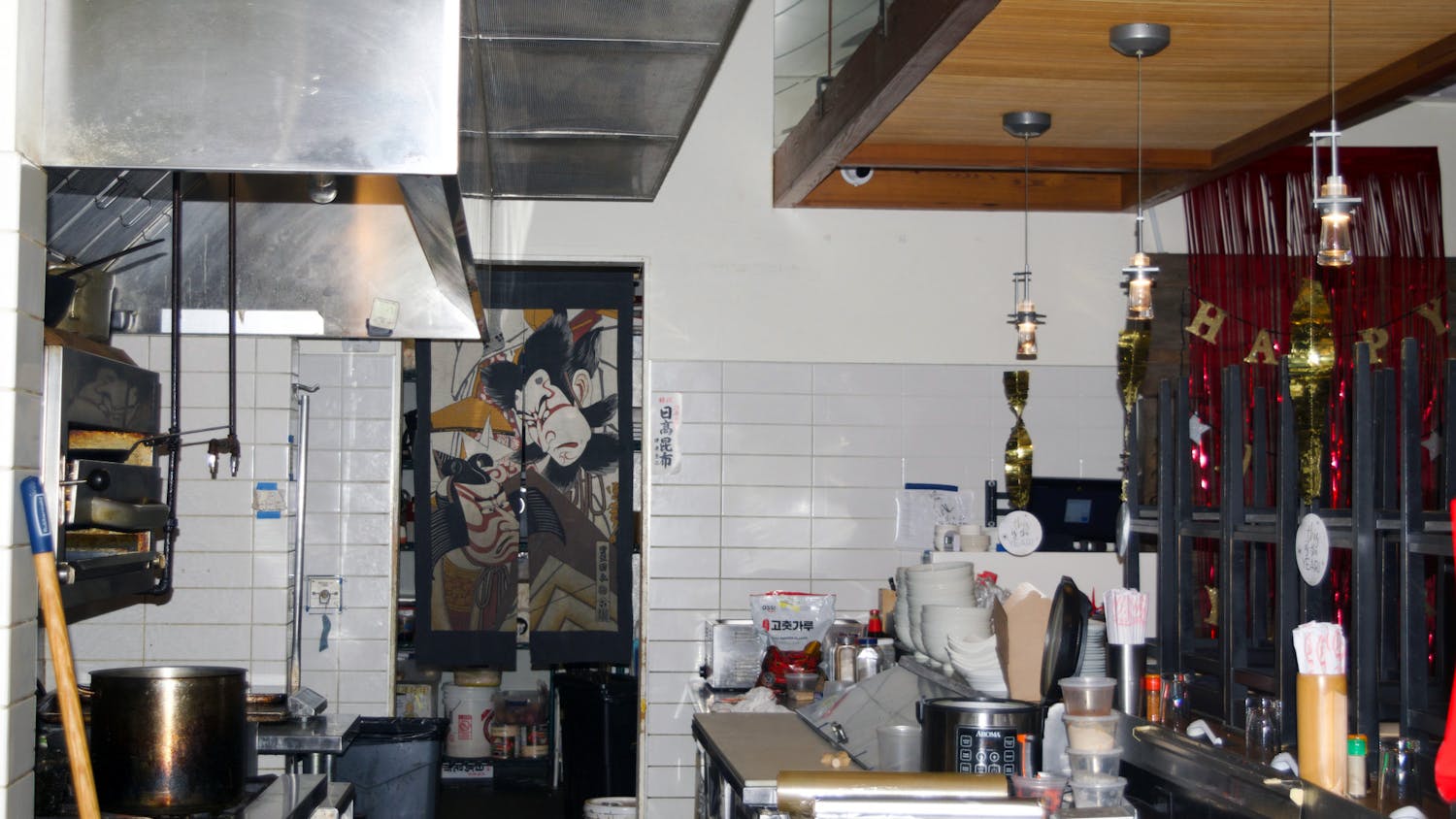 Crane Ramen preparing for a celebratory New Year’s Eve party the night before their official closing Saturday, Dec. 31, 2022.