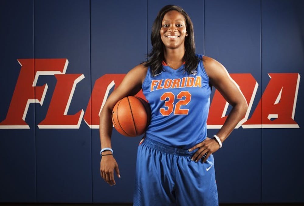 <p>Senior Jennifer George poses for photos during UF Media Day on Oct. 10. George racked up 15 points and nine rebounds in a losing effort against Michigan on Saturday.</p>