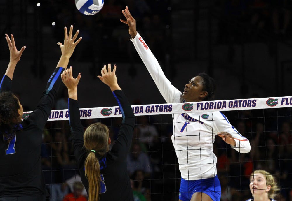 Rhamat Alhassan finished Sunday's match against Tennessee with a total of six blocks, enough to set the Florida record for career blocks.