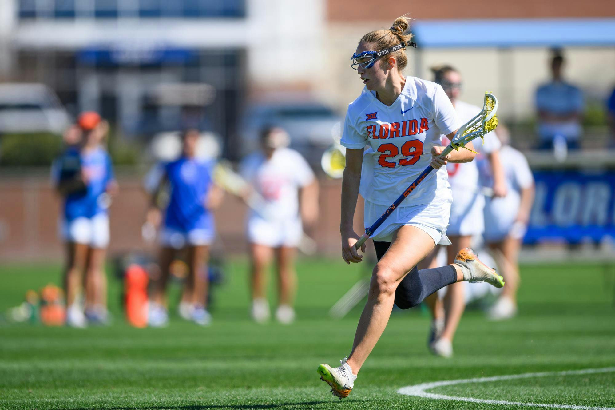 Florida midfielder Boo DeWitt (29) runs during the second half of an NCAA lacrosse match against Michigan, Friday, Feb. 13, 2026, in Gainesville, Fla.