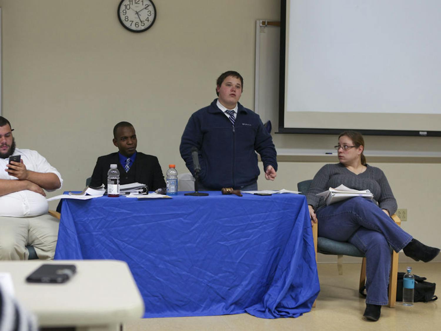From left, SFC SG parliamentarian Andy Alvarez, Student Senate President Jeremy Pierce, Senate Pro Tempore Dalton King and Senate Secretary Kelly Cooper preside over Pierce’s impeachment along with other issues, at the SFC Student Senate meeting Wednesday.