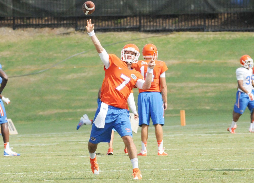 UF quarterback Will Grier passes during practice Aug. 8, 2015, at Donald R. Dizney Stadium.