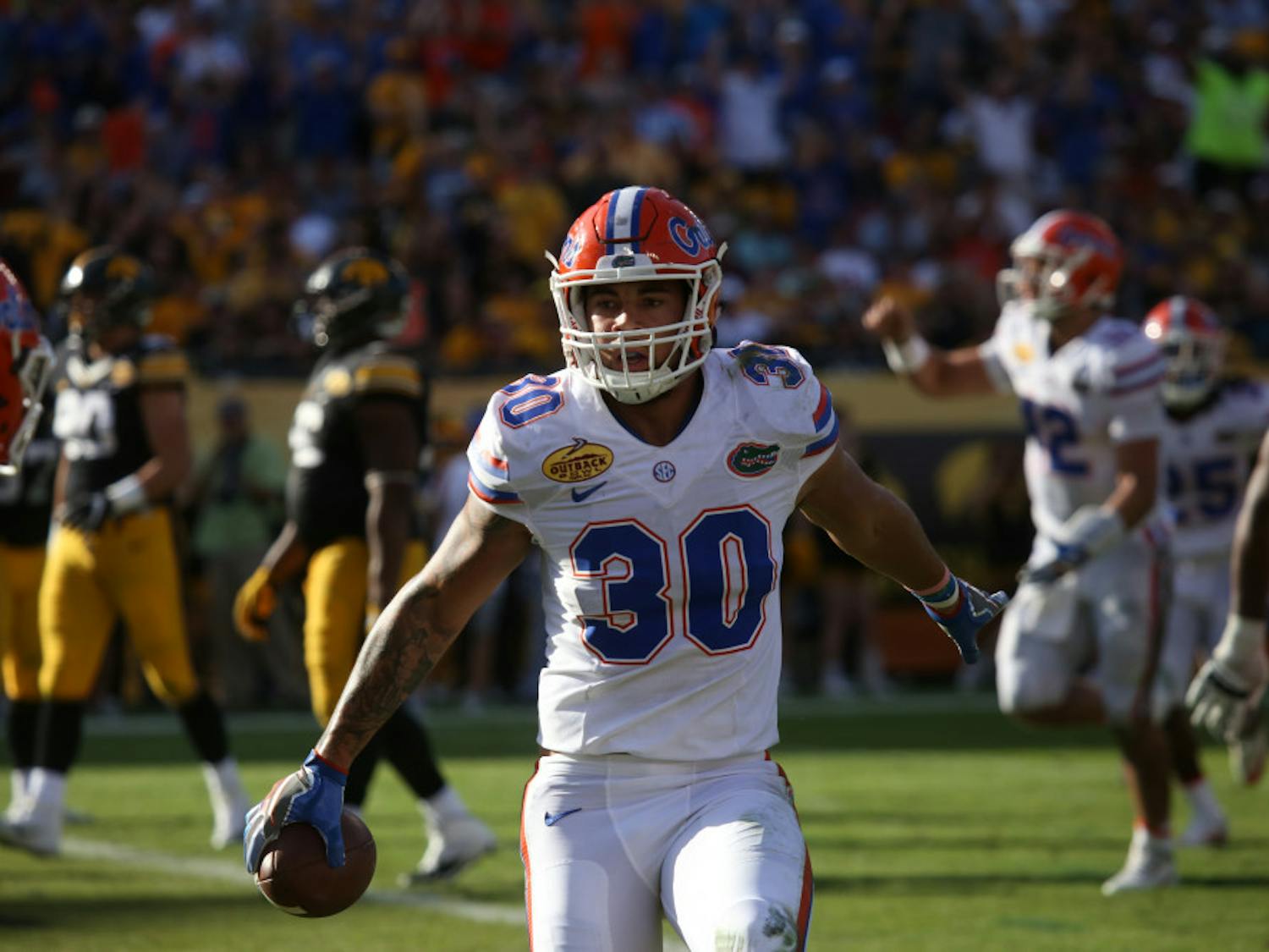 DeAndre Goolsby runs out of bounds after catching a pass during UF's 30-3 win against Iowa at the Outback Bowl on Jan. 2, 2017, at Raymond James Stadium.