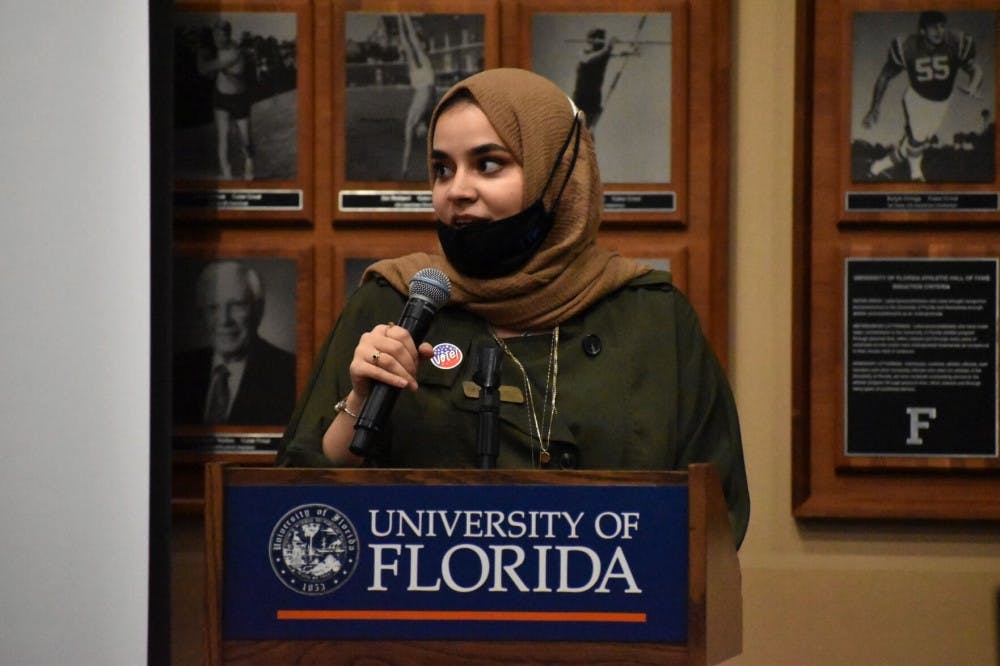 A picture of Mona Samsam speaking at Linda Soursour's speaking event