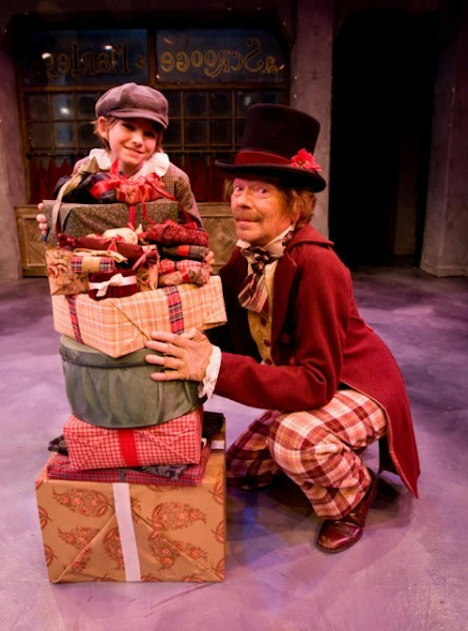 Tiny Tim (Whitney Humphrey) and Scrooge (Rusty Salling) starred in the 2009 production of "A Christmas Carol." &nbsp;