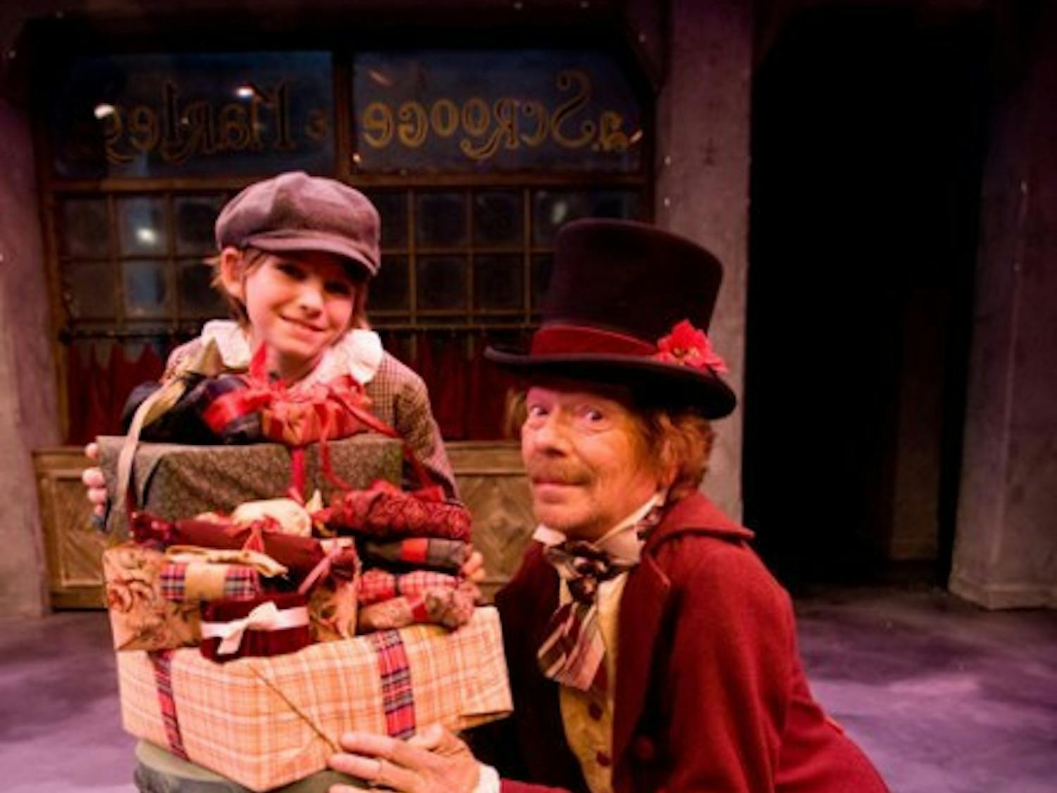 Tiny Tim (Whitney Humphrey) and Scrooge (Rusty Salling) starred in the 2009 production of "A Christmas Carol." &nbsp;