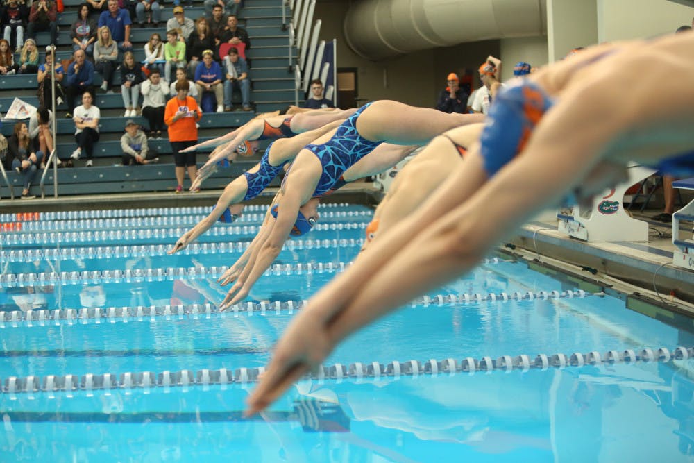 <p>The UF swimming and diving teams improved to a combined 6-0 on Saturday.</p>