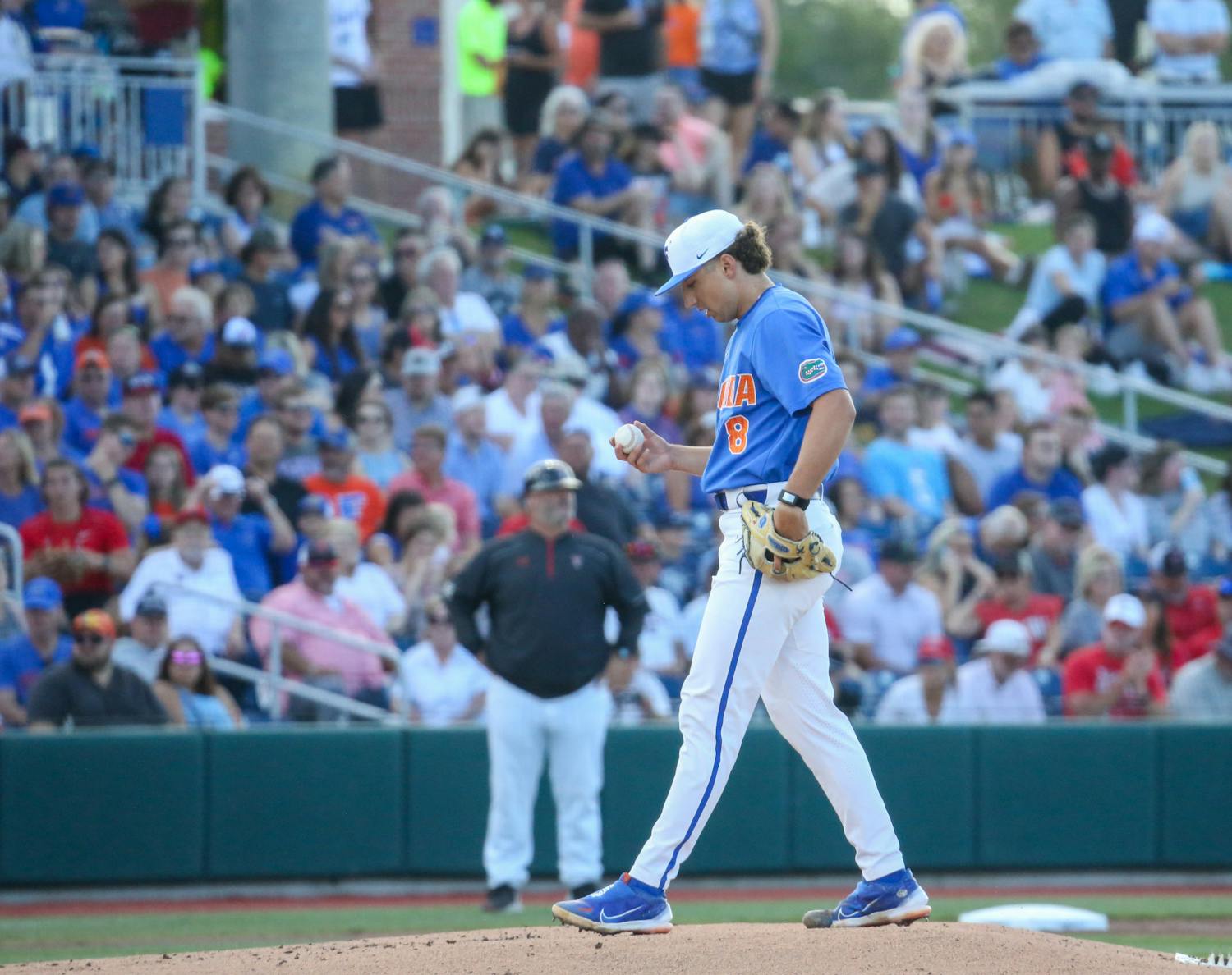 Florida starting pitcher Brandon Sproat steps off the mound during the Gators' 5-4 loss to Texas Tech Saturday, June 3, 2022. 