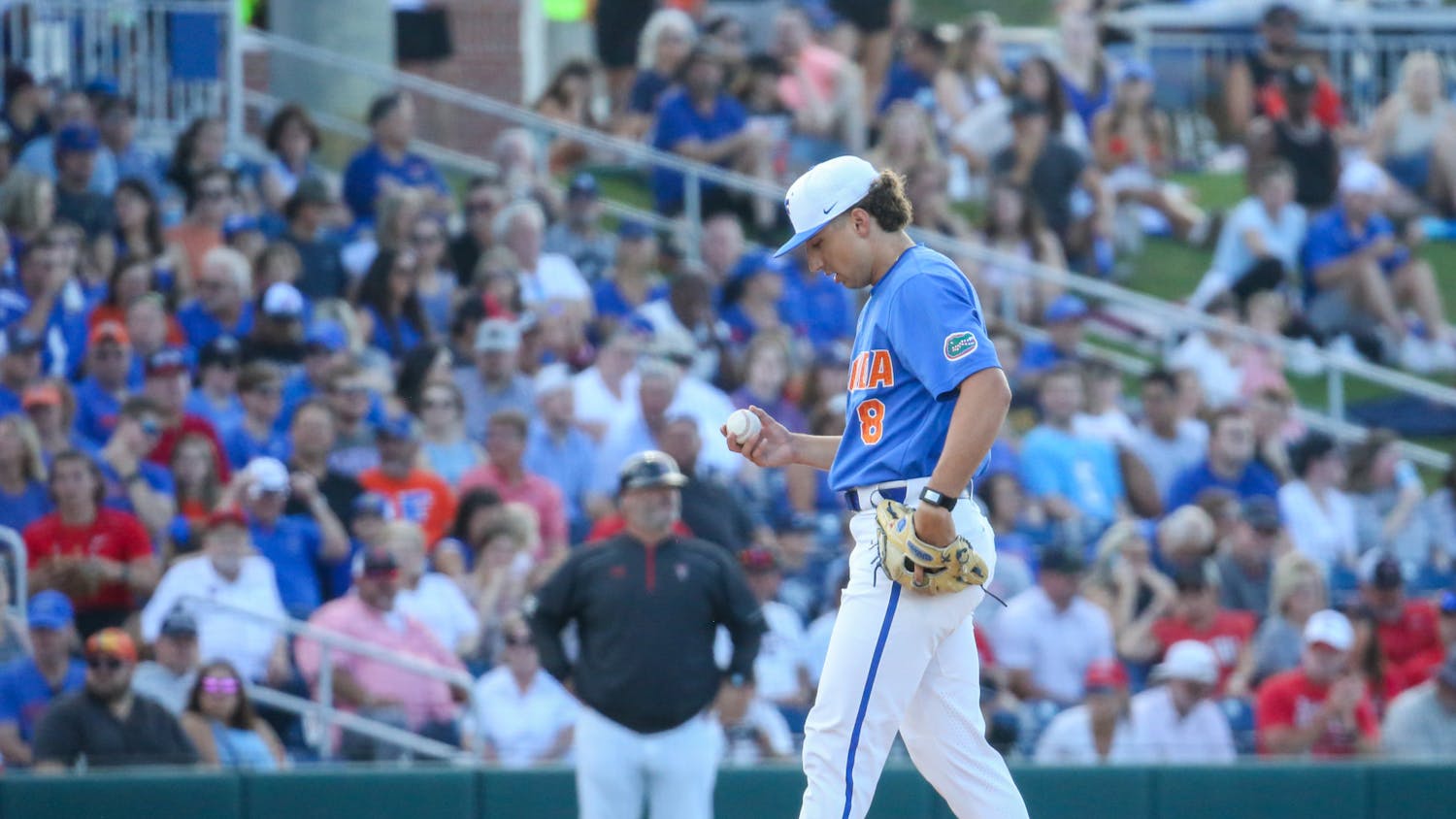 Florida starting pitcher Brandon Sproat steps off the mound during the Gators' 5-4 loss to Texas Tech Saturday, June 3, 2022. 