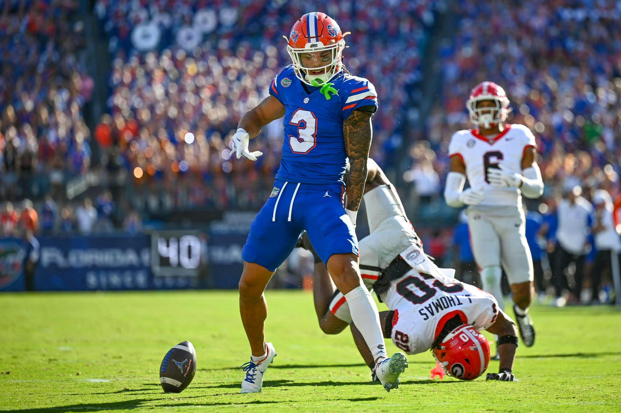 Florida wide receiver Eugene Wilson III (3) celebrates after catching a pass during a NCAA college football game, Saturday, Nov. 1, 2025, in Jacksonville, Fla.