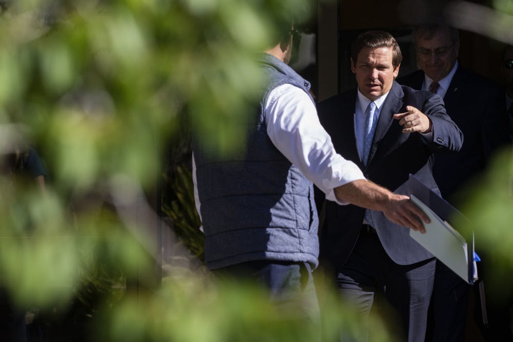 Florida Gov. Ron Desantis speaks about the environment to a crowd of about 50 people April 16 at the Steinmetz Hall courtyard. 