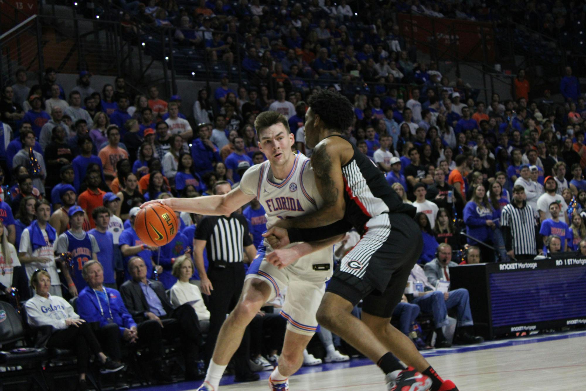 Florida forward Colin Castleton posts up a Georgia defender in the Gators' 82-75 victory over the Bulldogs Saturday, Jan. 7, 2023.