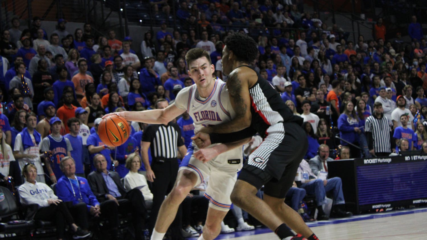 Florida forward Colin Castleton posts up a Georgia defender in the Gators' 82-75 victory over the Bulldogs Saturday, Jan. 7, 2023.