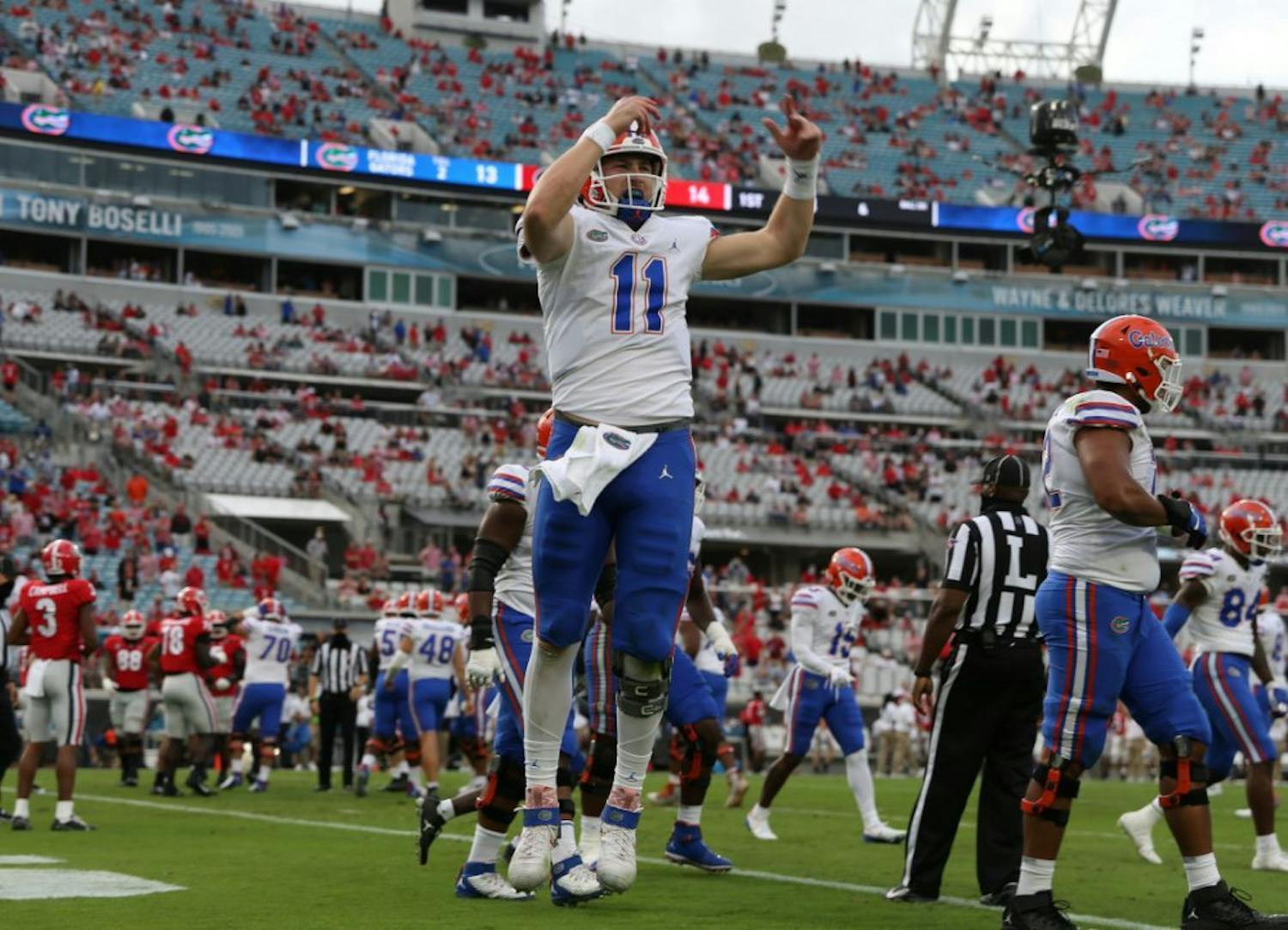 Florida quarterback Kyle Trask hypes up the crowd at TIAA Bank Stadium in Jacksonville, Florida, Saturday. The Gators defeated the Bulldogs in the most recent rivalry game on Nov. 7.