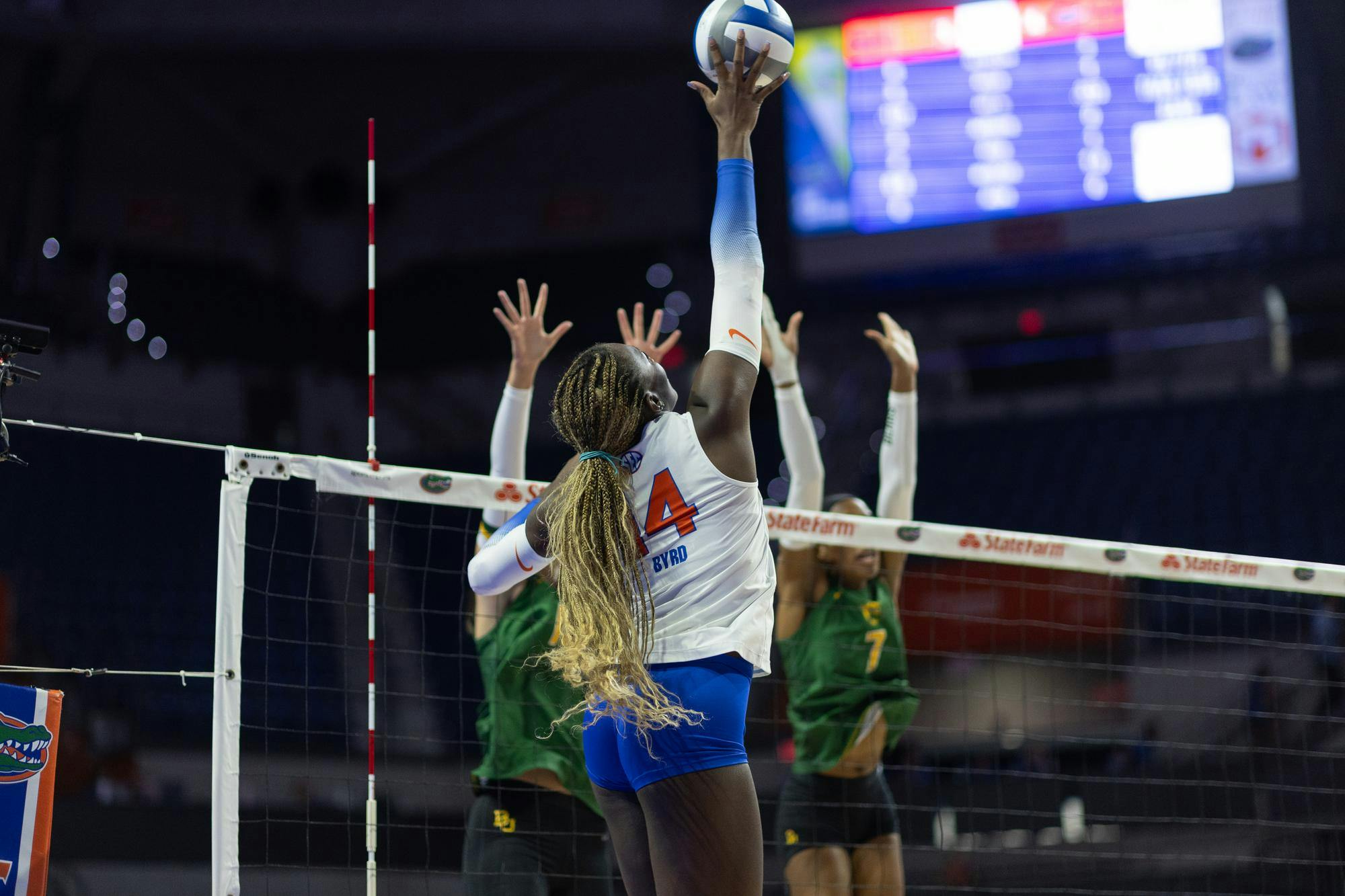 Florida Gators outside hitter Jordyn Byrd (14) pushes the ball over the net during a volleyball match against the Baylor Bears at Exactech Arena at the Stephen C. O'Connell Center on Sunday, September 14, 2024.