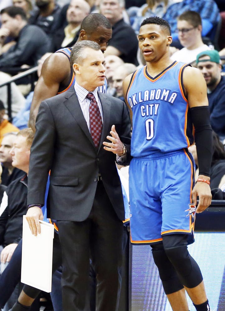 Oklahoma City Thunder head coach Billy Donovan, left, chats with Russell Westbrook in the second half of an NBA basketball game against the Minnesota Timberwolves, Wednesday, Jan. 27, 2016, in Minneapolis. The Thunder won 126-123. (AP Photo/Jim Mone)