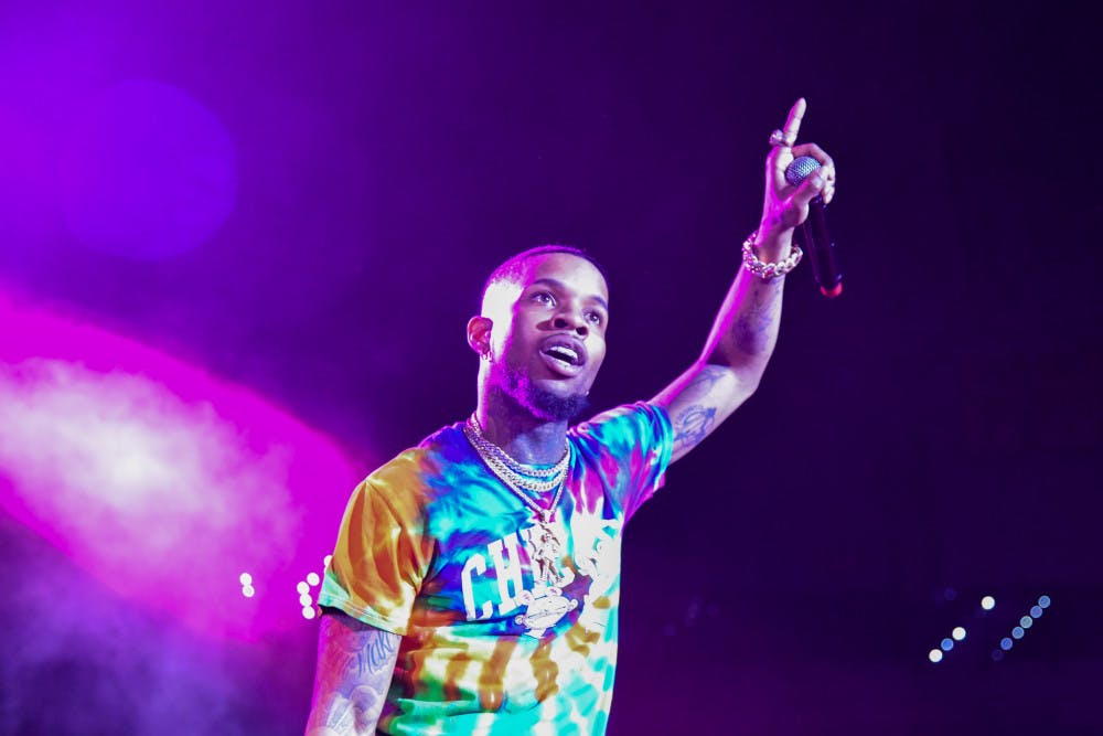<p>Tory Lanez sings his first song to the audience at the O'Connell Center Monday night, but stops in between songs to smile at the crowd. More than 3,000 people came to see Lanez perform.</p>