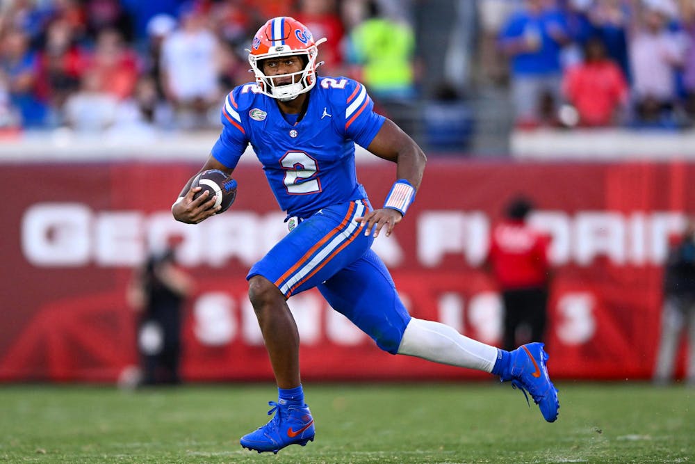 Florida quarterback DJ Lagway (2) runs with the ball during a NCAA college football game, Saturday, Nov. 1, 2025, in Jacksonville, Fla.