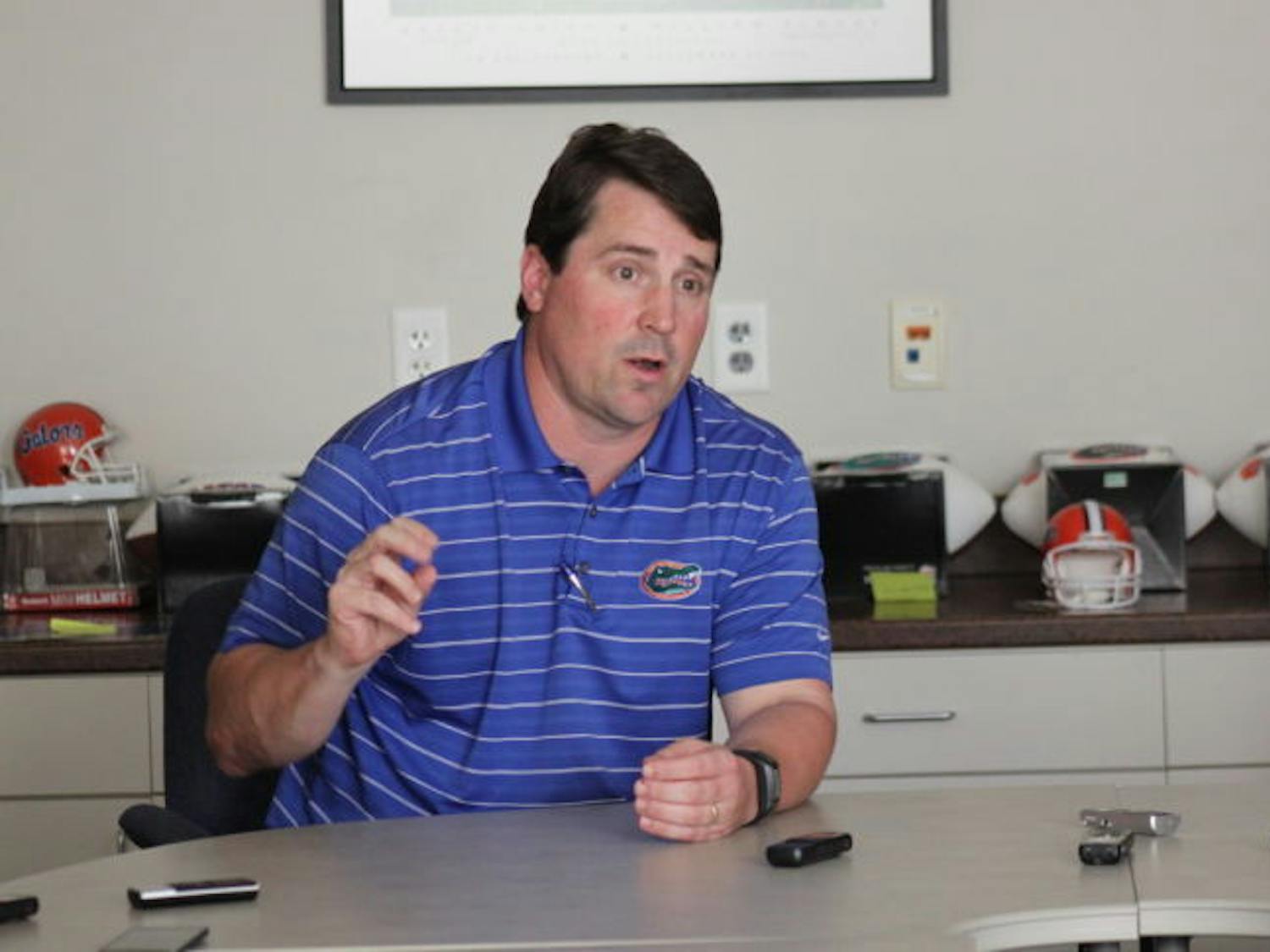 Will Muschamp speaks to reporters prior to Tuesday's Gator Gathering at Emerson Hall.
