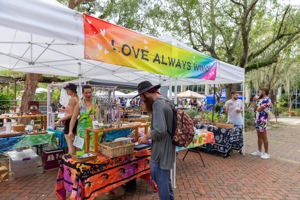 Festival goers shop at a booth at Gainesville Pride Fest on Saturday, Sept. 28, 2024. 