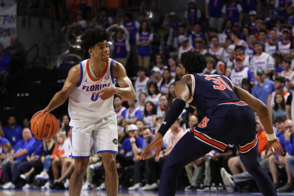 Gators men's basketball guard Zyon Pullin calls the offense in the team's win over the Auburn Tigers on Saturday, February 10, 2024. 