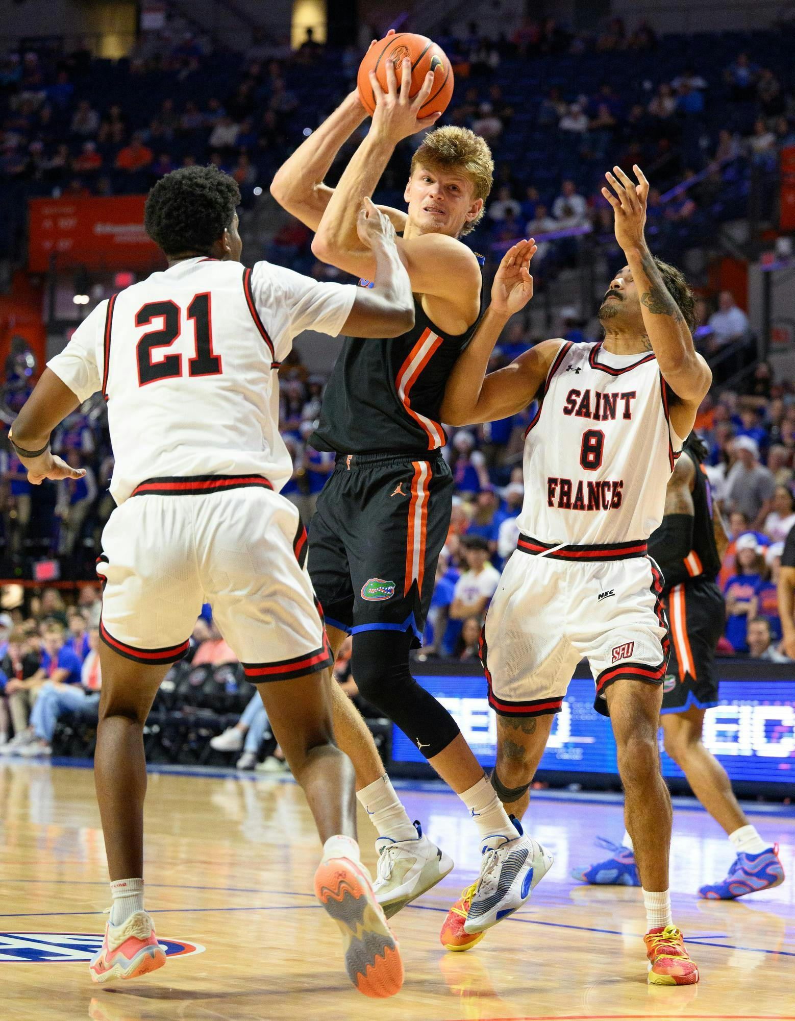 Florida forward Thomas Haugh (10) drives during the second half of an NCAA college basketball game against Saint Francis, Wednesday, Dec. 17, 2025, in Gainesville, Fla.