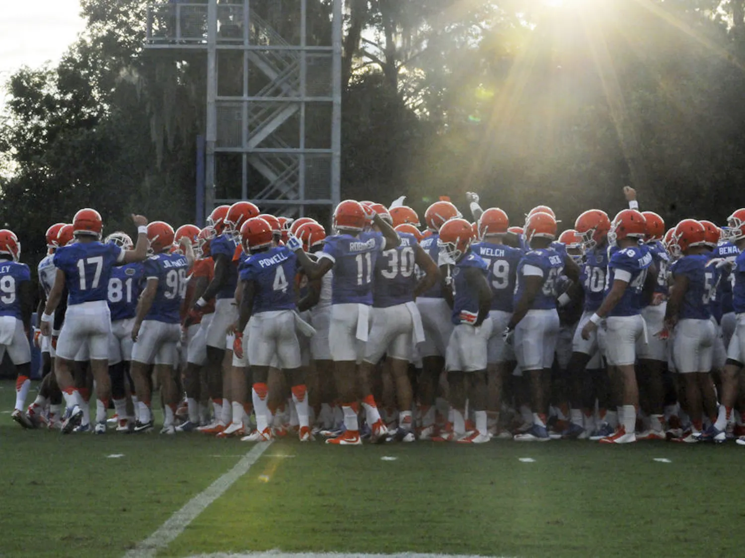 Florida football players huddle at practice at the Sanders Practice Field Aug. 31, 2015.
