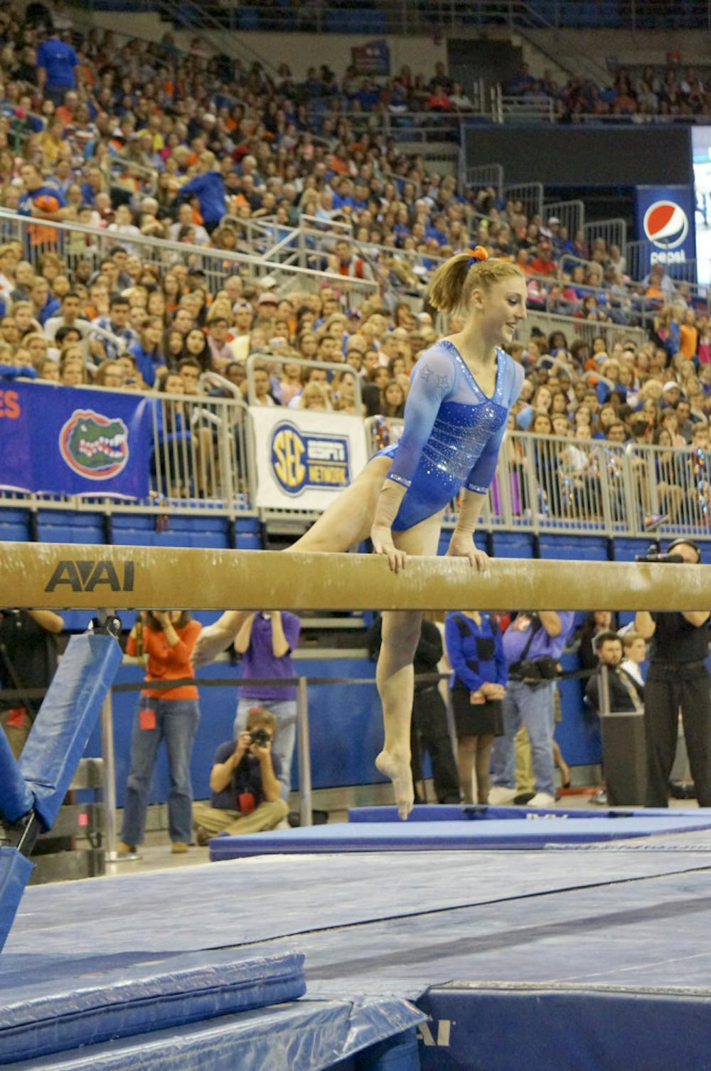 <p>Alex McMurtry performs her balance beam routine during Florida's win against Georgia on Jan. 30, 2015.</p>