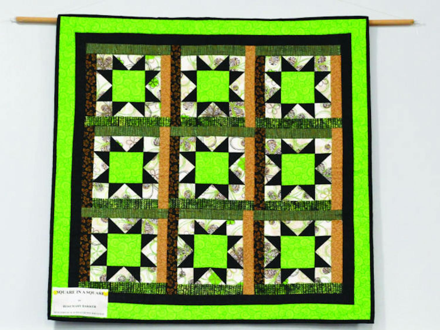 A quilt hangs on the wall of the Gainesville Tower Road Library, 3020 SW 75th St. It is part of the Quilters of Alachua County Day Guild’s library display that celebrates National Quilting Month.