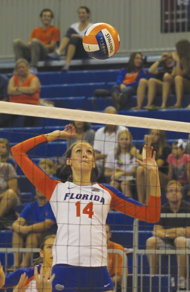 Redshirt senior middle blocker Betsy Smith attempts an attack in Florida’s 3-0 win  against Ole Miss on Oct. 12 in the O’Connell Center. Smith is fourth on the team with 1.98 kills per set this season. 
