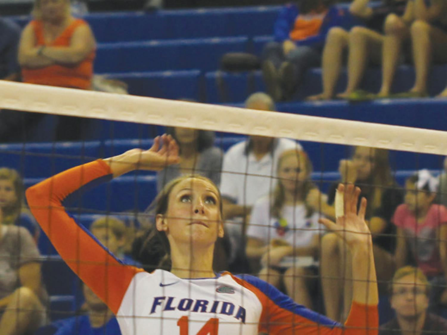 Redshirt senior middle blocker Betsy Smith attempts an attack in Florida’s 3-0 win  against Ole Miss on Oct. 12 in the O’Connell Center. Smith is fourth on the team with 1.98 kills per set this season. 
