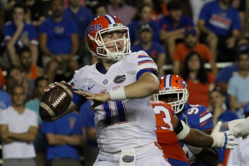 <p>Quarterback Kyle Trask was carted off the Gators' practice field with a lower body injury Wednesday, according at a 247Sports report.</p>