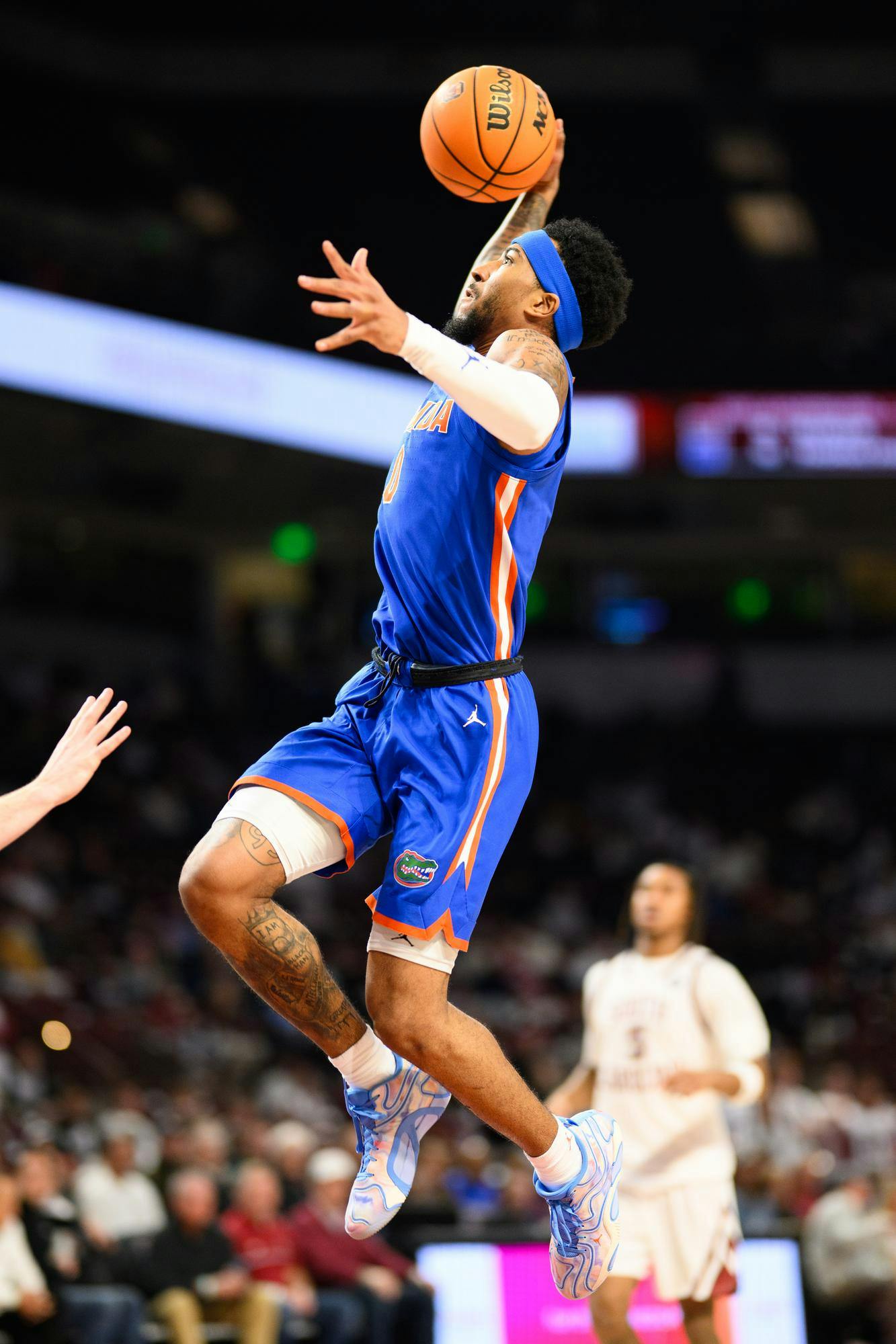Florida guard Boogie Fland (0) dunks during the second half of an NCAA college basketball game against South Carolina, Wednesday, Jan. 28, 2026, in Columbia, S.C.