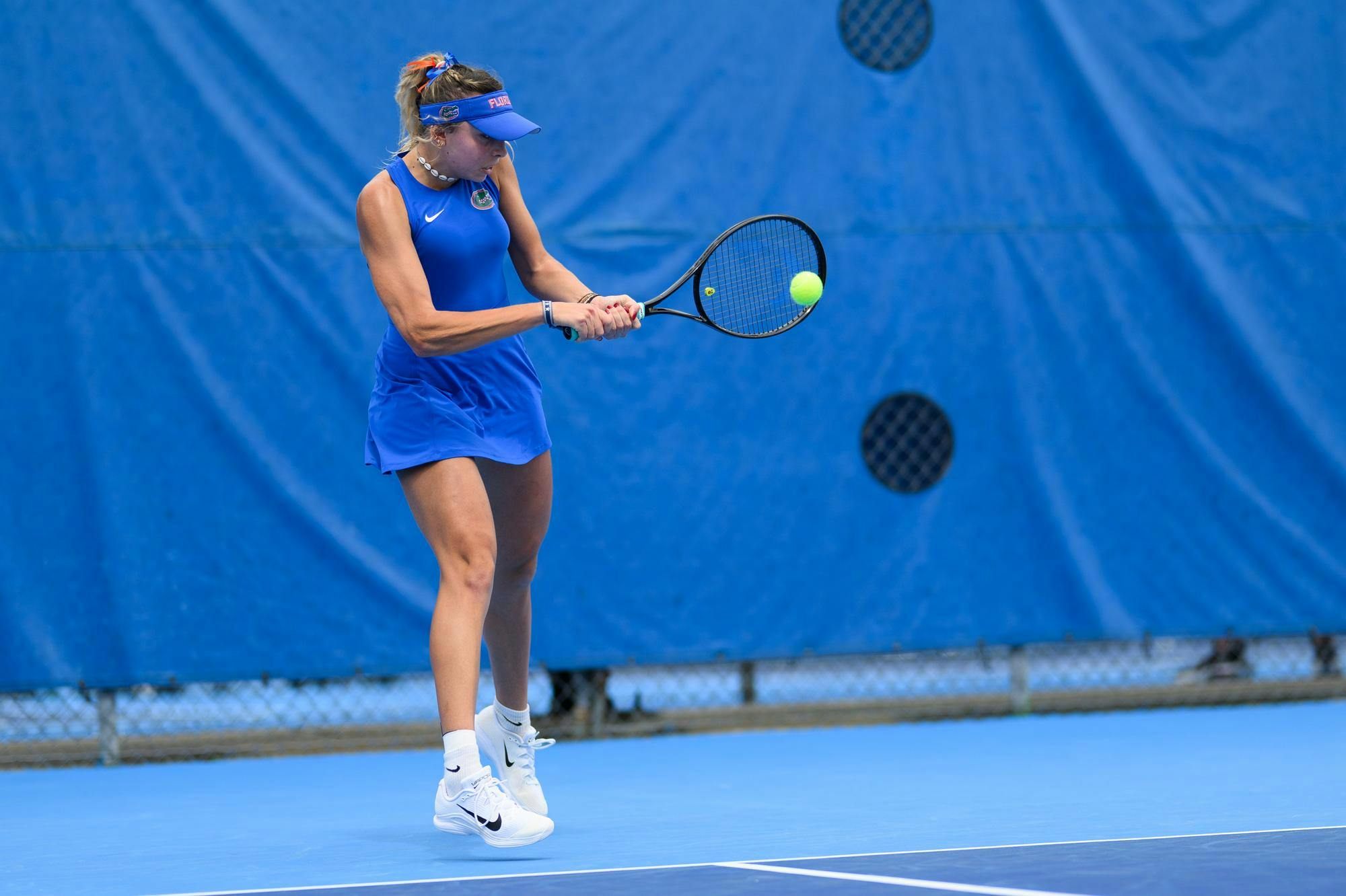 Florida tennis player Lucie Pawlak returns during an NCAA tennis match against Oklahoma, Saturday, Feb. 28, 2026, in Gainesville, Fla.
