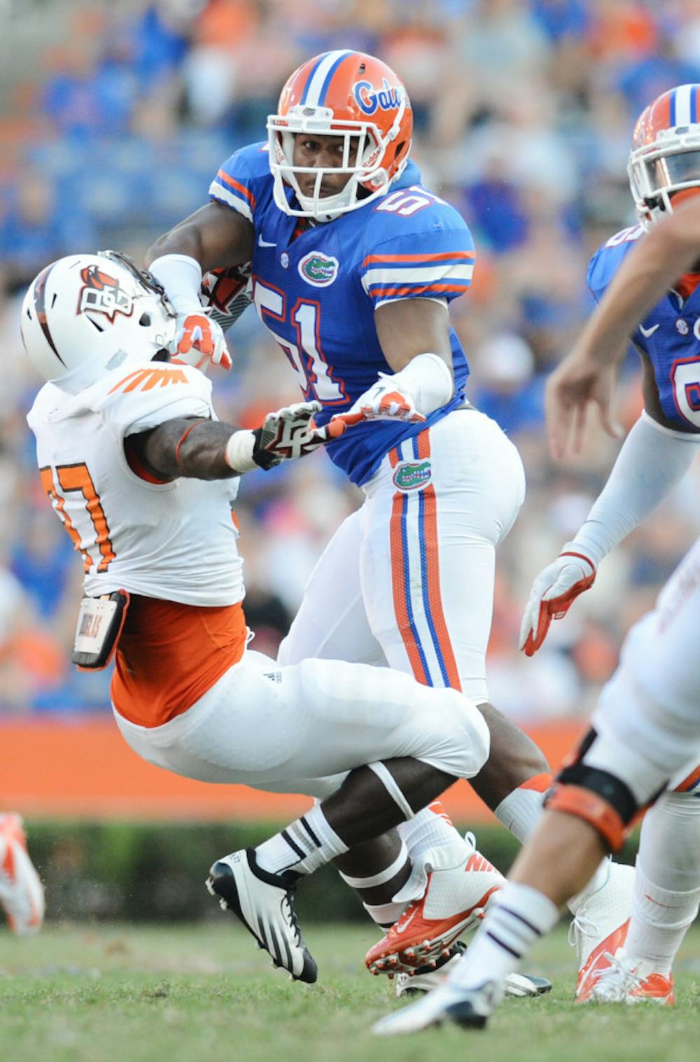 <p align="justify">Florida linebacker Michael Taylor blocks an opponent during UF’s 27-14 victory against Bowling Green on Sept. 1, 2012.</p>