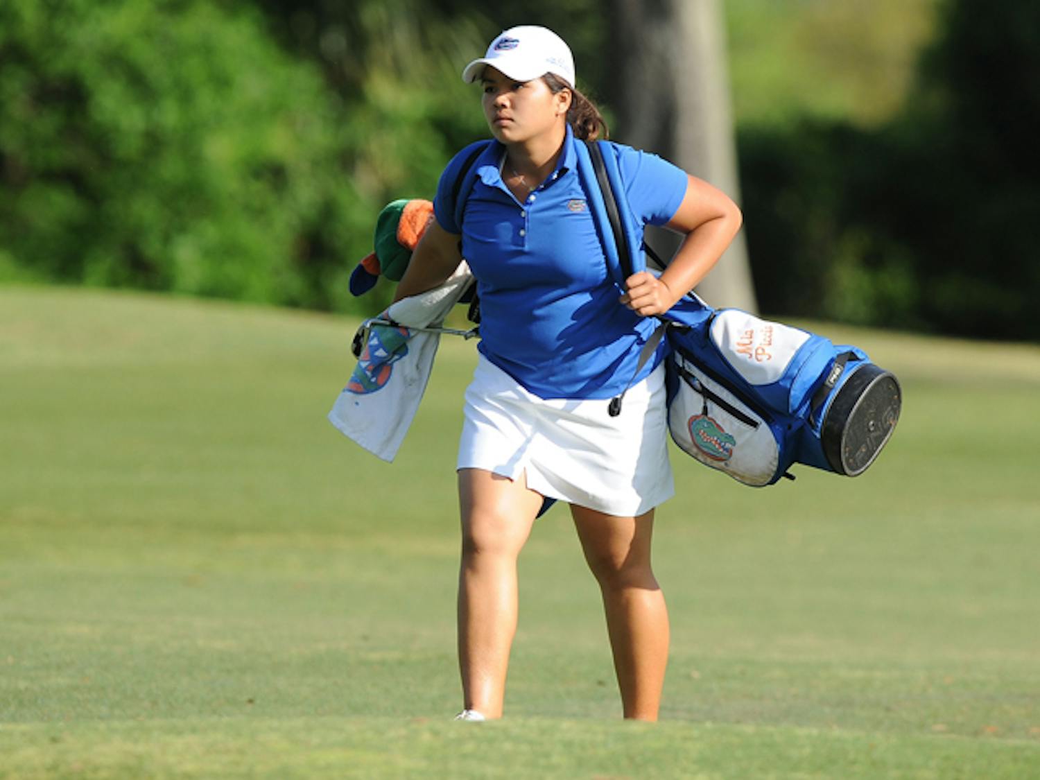 
UF golfer Mia Piccio carries her bag at the Betsy Rawls Invitational on Nov. 2, 2011. Piccio carded a 73 (+1) in Florida's first round at the NCAA Championships on Tuesday at the UGA Golf Course.&nbsp;
