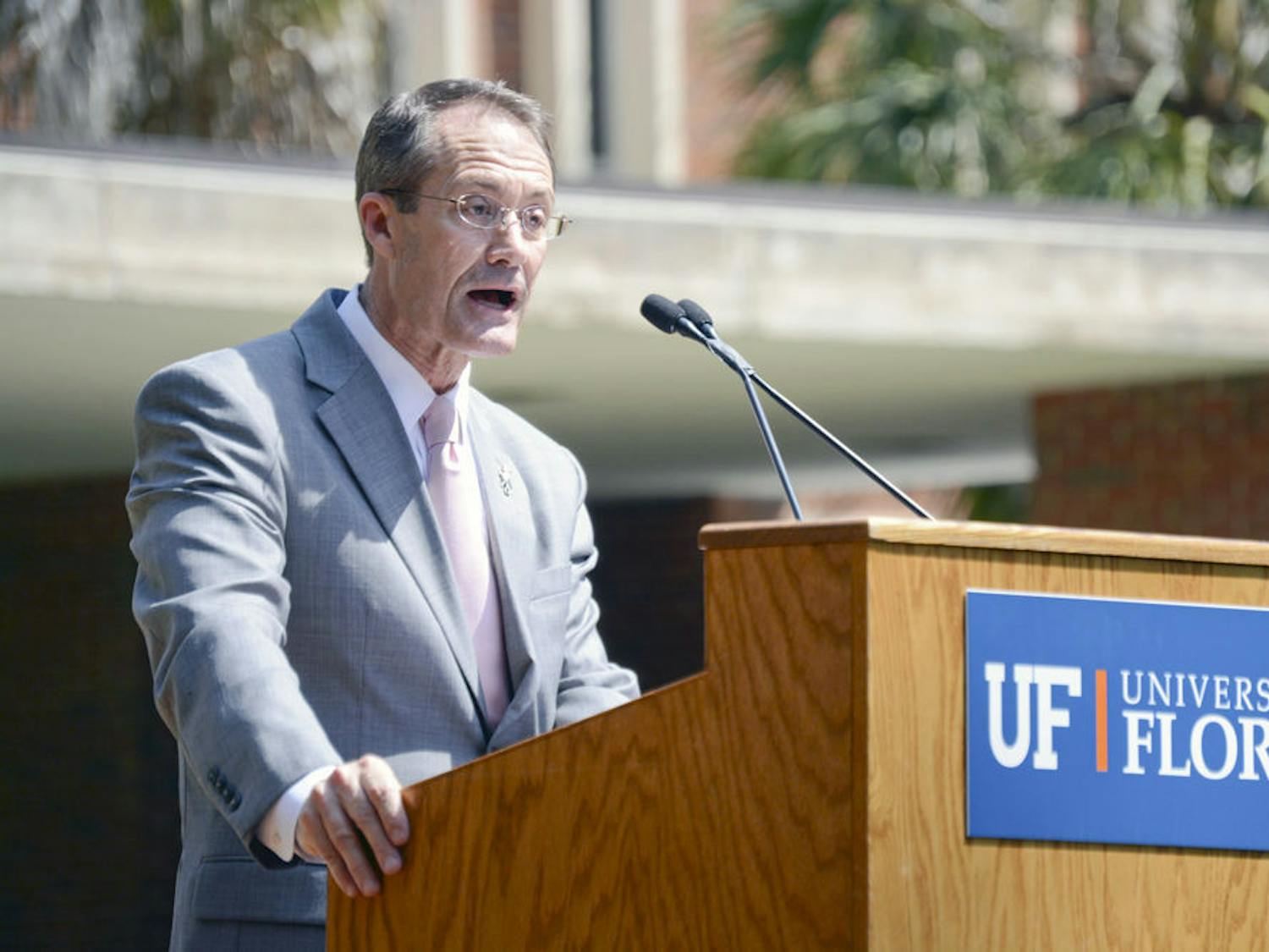 Dr. Charlie Lane, senior vice president of UF, speaks to a crowd on Plaza of the Americas on Wednesday about UF’s sustainability achievements and goals. “What’s really important is that students who recycle, ride the bus or learn about composing will embrace these actions for the rest of their lives,” Lane said.