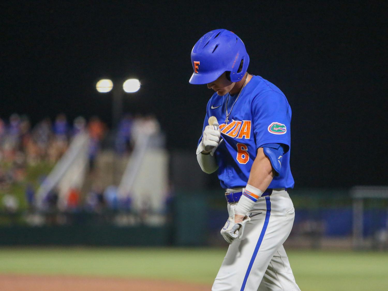 Florida junior Tyler Shelnut adjusts his jersey during the Gators’ 6-2 win against Vanderbilt Saturday, May 13, 2023.