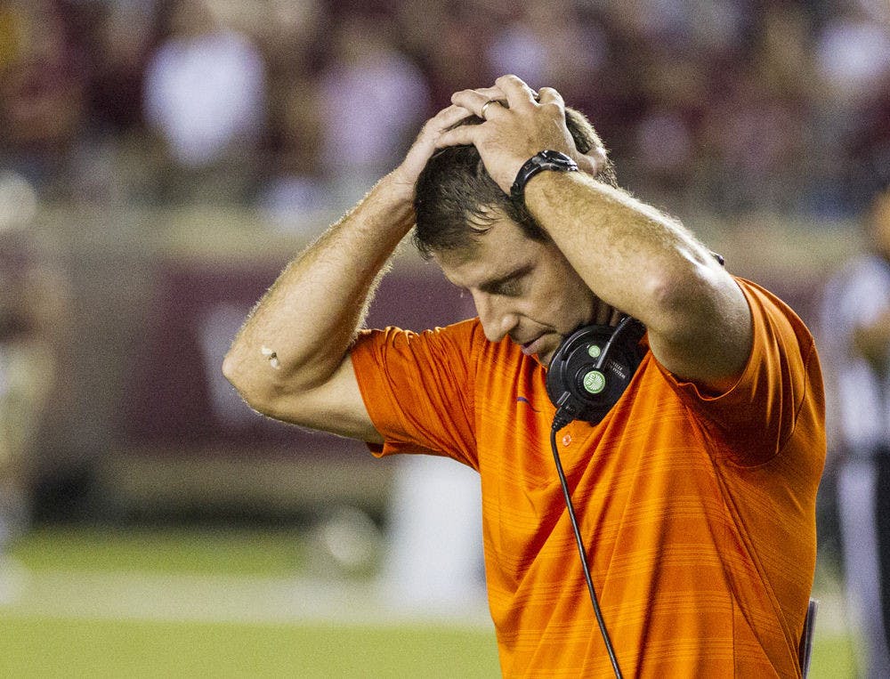 <p>Clemson coach Dabo Swinney reacts at the end of regulation against Florida State in Tallahassee,on Saturday. Florida State defeated Clemson 23-17 in overtime.</p>